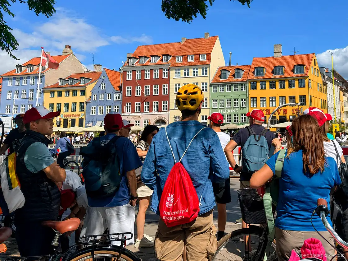 Riders passing Kastellet fortress on a Copenhagen Christiania bike tour